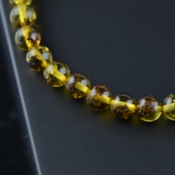 Medium green round amber bracelet